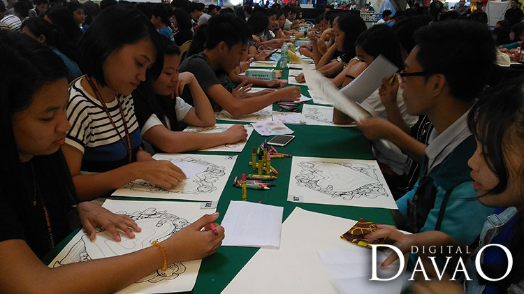 Participants begin their artwork at the Art for love for art event
